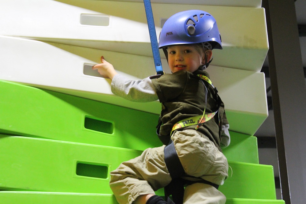 Adorable kid climbing