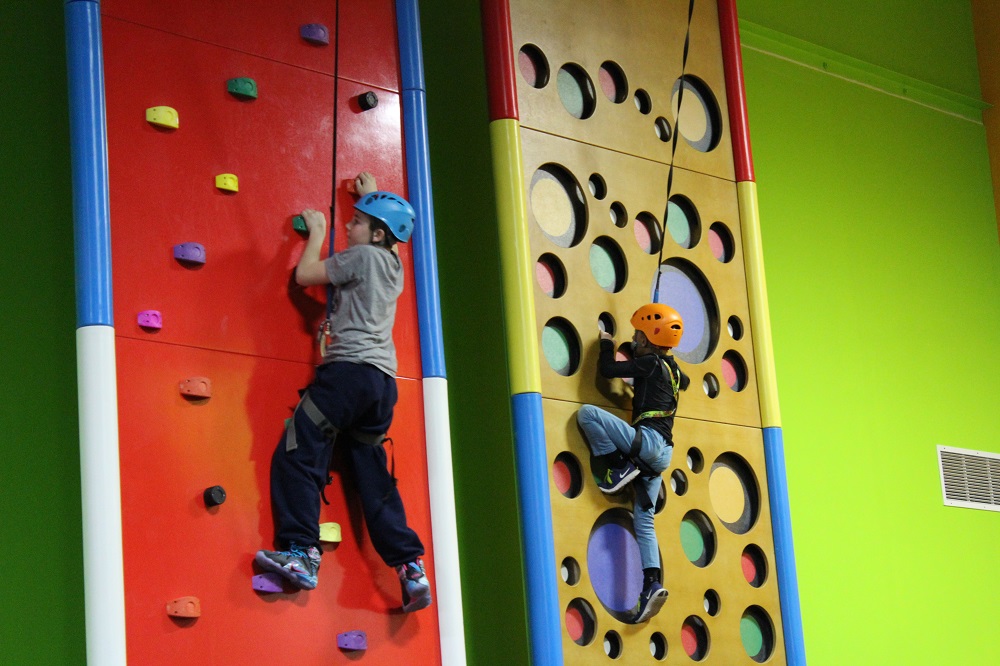 two kids climbing